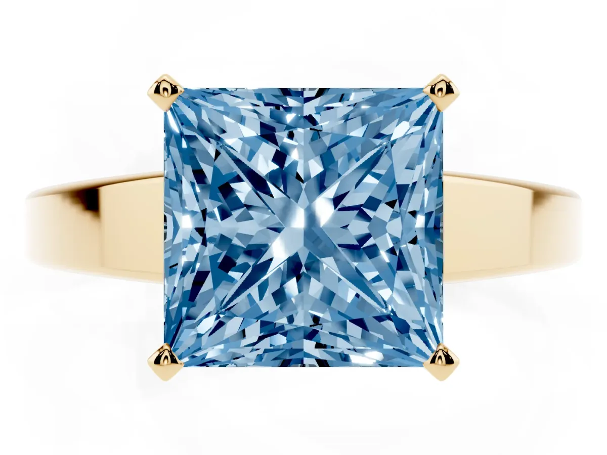 Fancy Blue Princess Cut Solitaire Engagement Ring with Four-Prong Setting and Tapered Band Yellow gold
