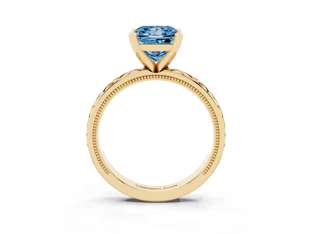 Fancy Blue Princess Cut Solitaire Diamond Ring with Milgrain and Black Enamel X Pattern Band Yellow gold