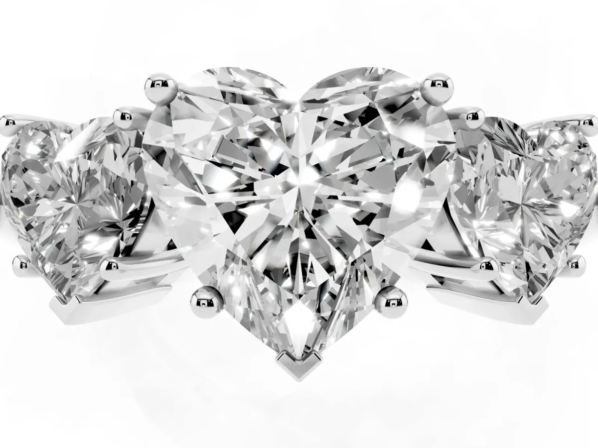 Three-Stone Heart Cut Cut Diamond Engagement Ring with Prong Setting on a White Gold Band Silver