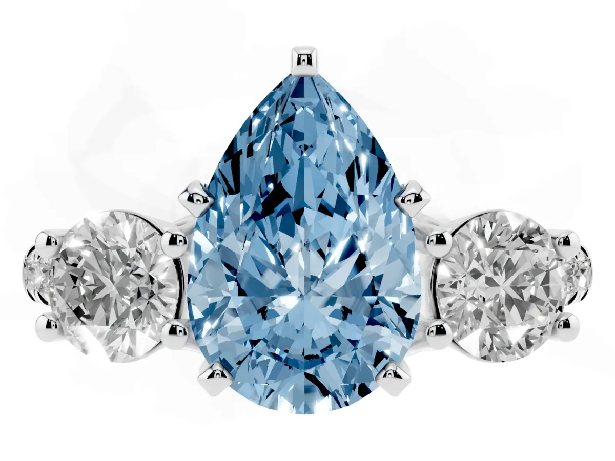 Fancy Blue Three-Stone Pear Cut Diamond Pavé Band with Four-Prong Setting Platinum