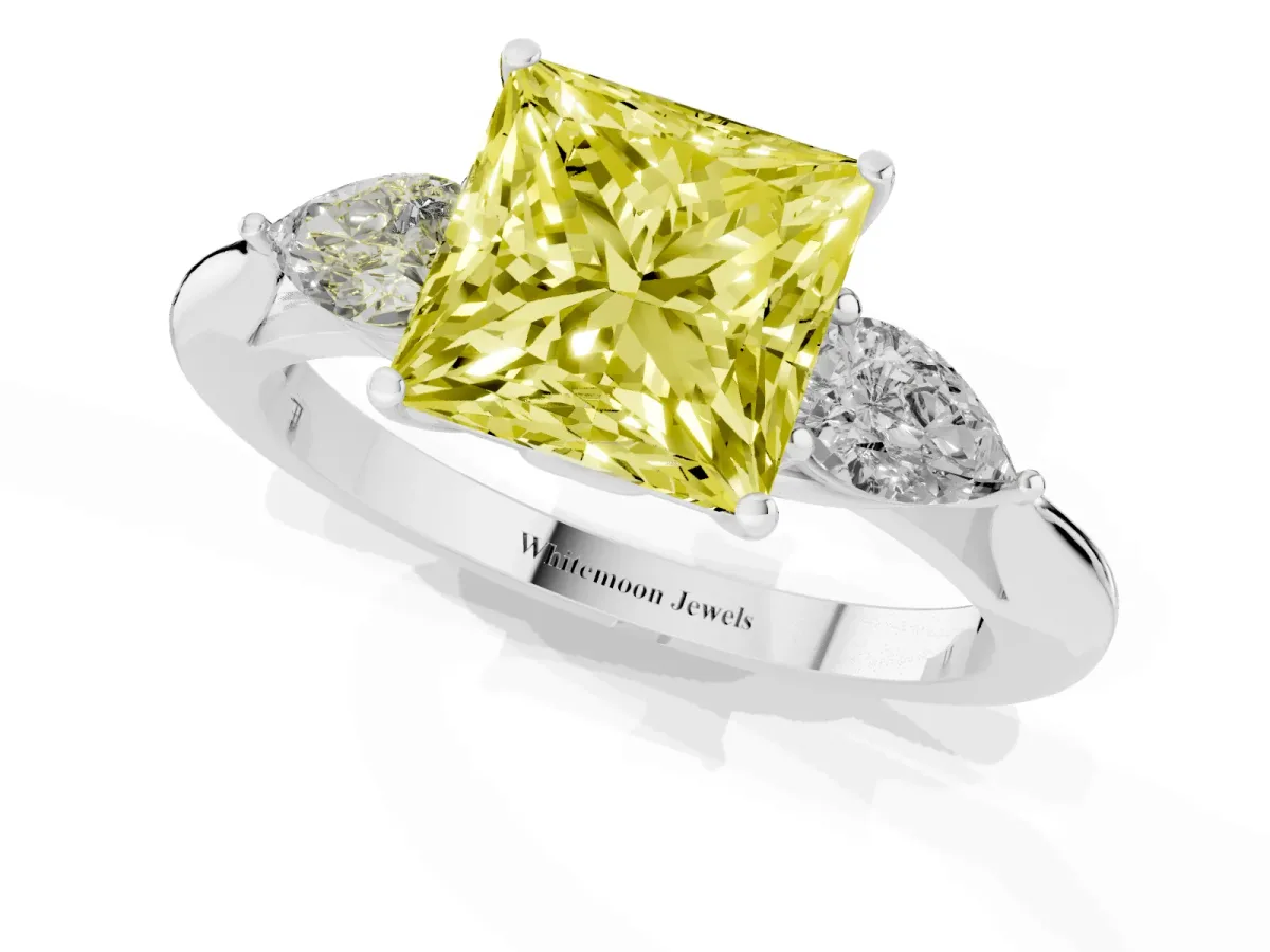 Fancy Yellow Three-Stone Princess Cut Brilliant Diamond Solitaire Ring with Tapered Band and Four-Prong Setting White gold