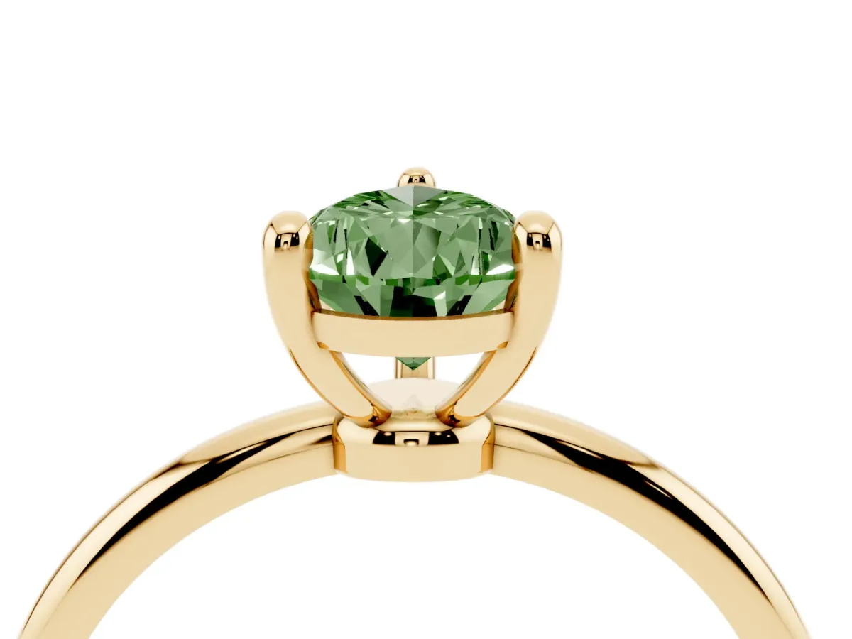 Fancy Green Pear Cut Solitaire Diamond Ring with 4-Prong Setting on a Classic Band Yellow gold