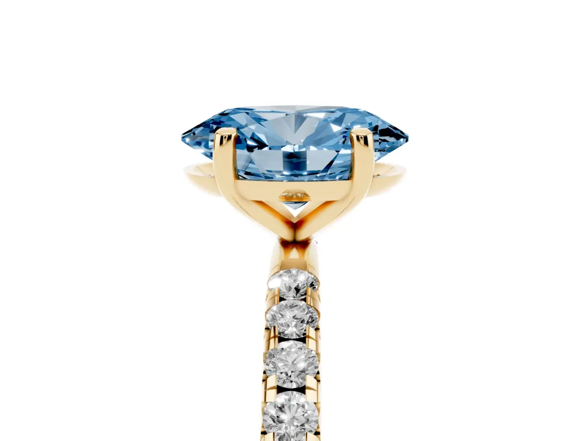 Fancy Blue Oval Cut Cut Diamond Solitaire Ring with Micro Pave Band and Four Prong Setting Yellow gold