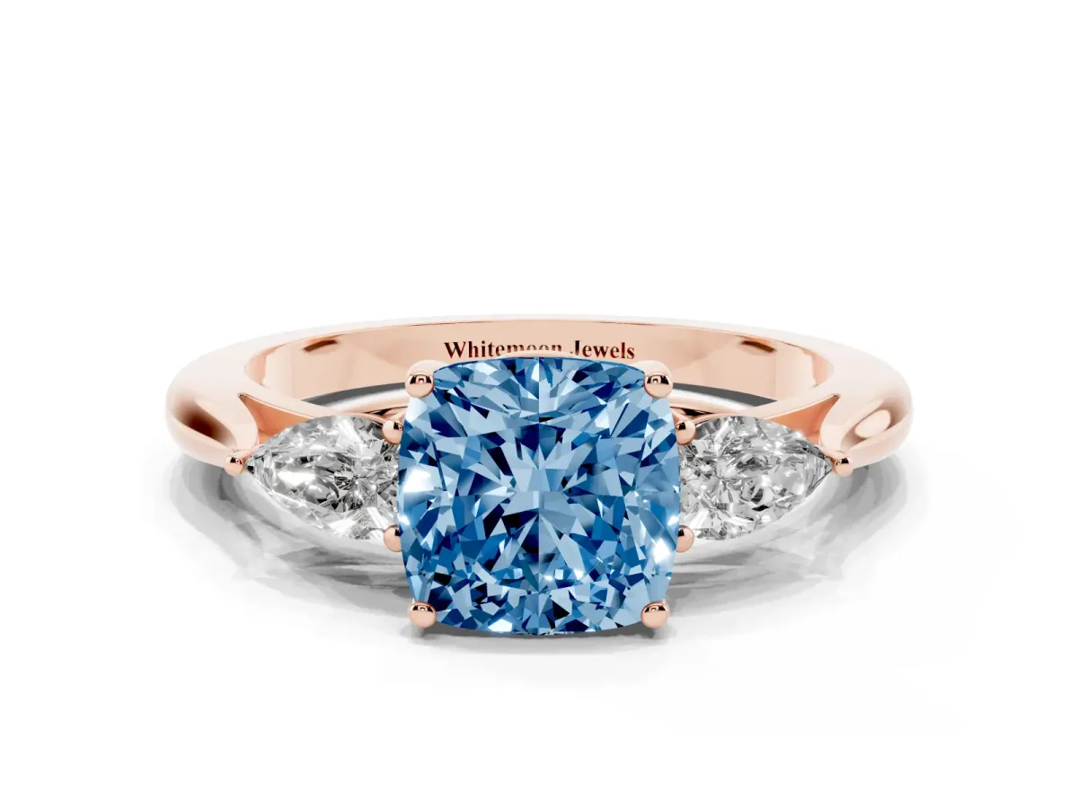 Fancy Blue Three-Stone Cushion Cut Brilliant Diamond Solitaire Ring with Tapered Band and Four-Prong Setting Rose gold