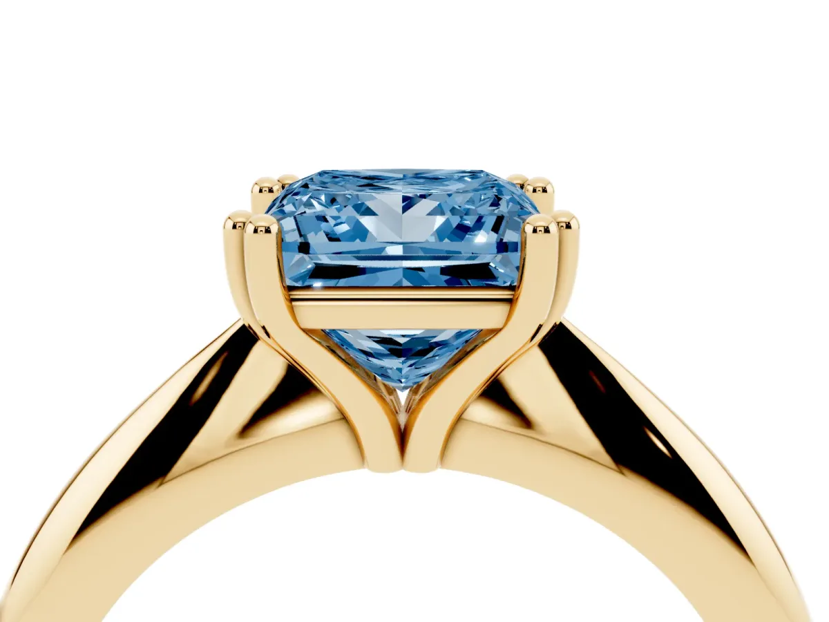 Fancy Blue Princess Cut Cut Solitaire Engagement Ring with Tapered Band and Four-Prong Setting Yellow gold