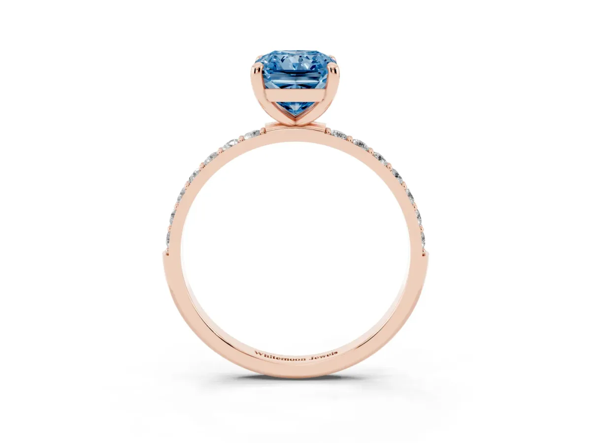 Fancy Blue Radiant Cut Diamond Solitaire Ring with Round Pavé Band and Prong Setting Rose gold