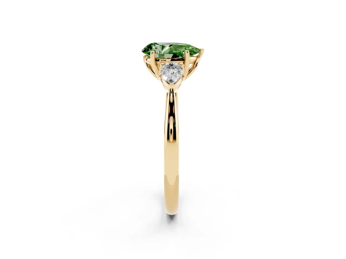 Fancy Green Three-Stone Pear Cut Diamond Ring with Pear Side Stones in Four-Prong Setting Yellow gold