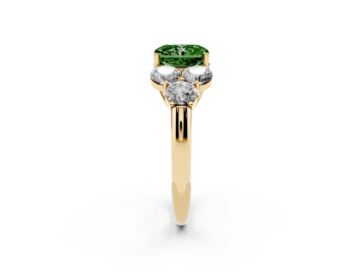 Fancy Green Radiant Cut Cut Diamond Cluster Ring with Round Accent Stones and Prong Setting on a Classic Band Yellow gold