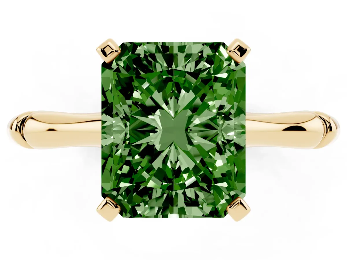 Fancy Green Radiant Cut Solitaire Diamond Ring with Bamboo Band and Four-Prong Setting Yellow gold