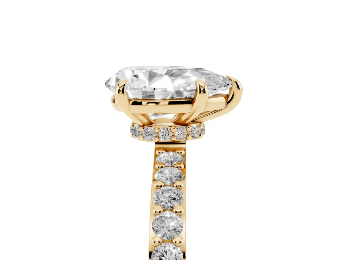 Pear Cut Diamond Pavé Engagement Ring with Round Accents and Prong Setting Yellow gold