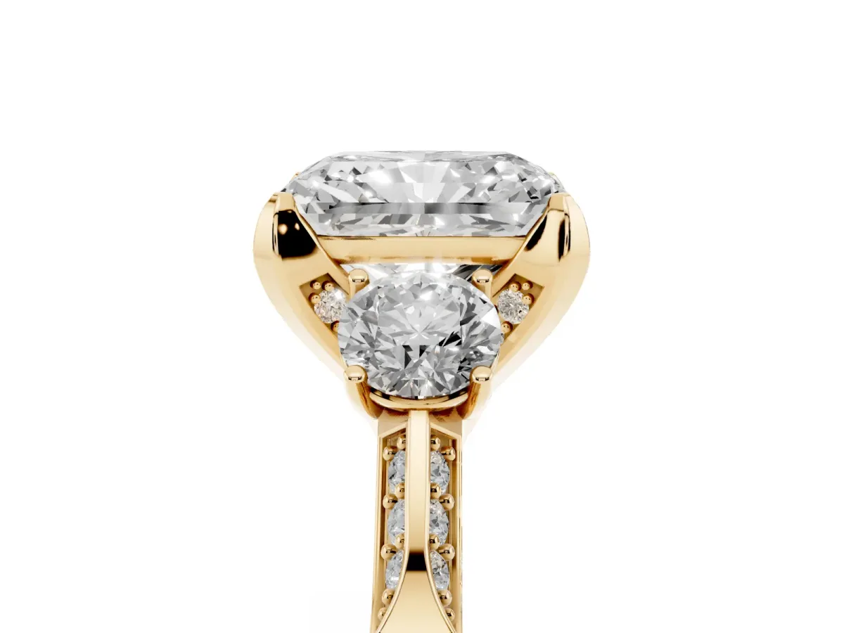 Radiant Cut Brilliant Three-Stone Diamond Ring with Pavé Band and Four-Prong Setting Yellow gold