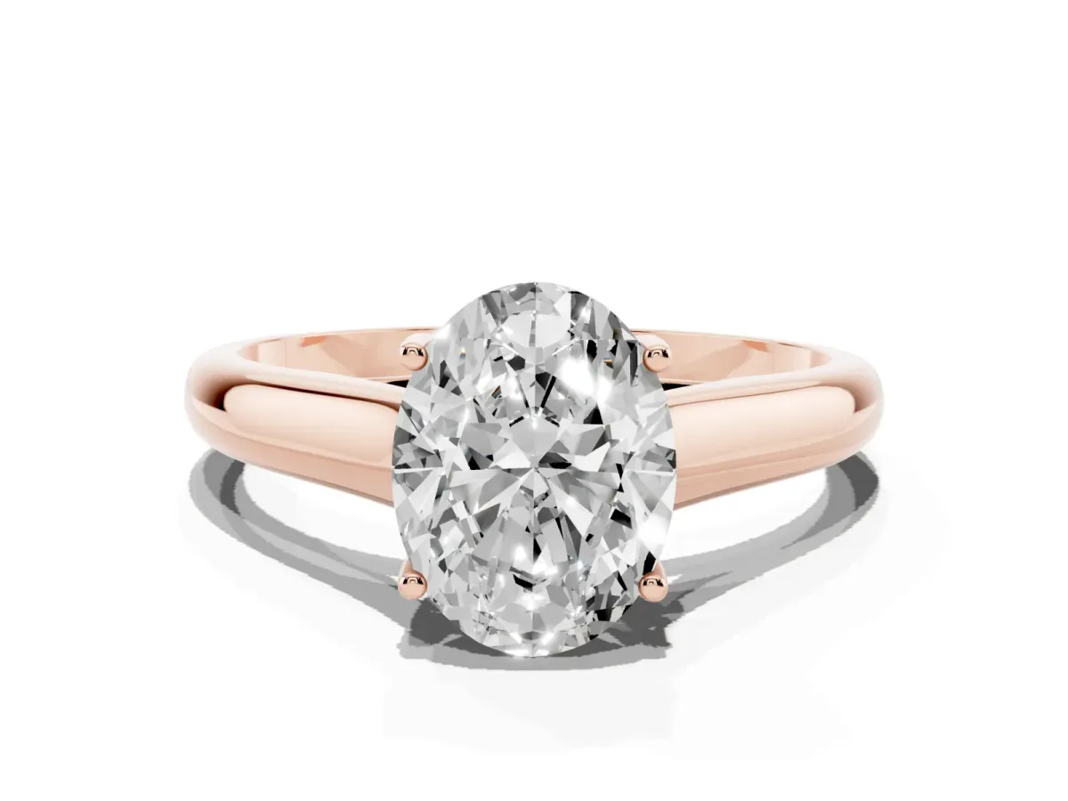 Oval Cut Solitaire Engagement Ring with Tapered Band and Four-Prong Setting Rose gold