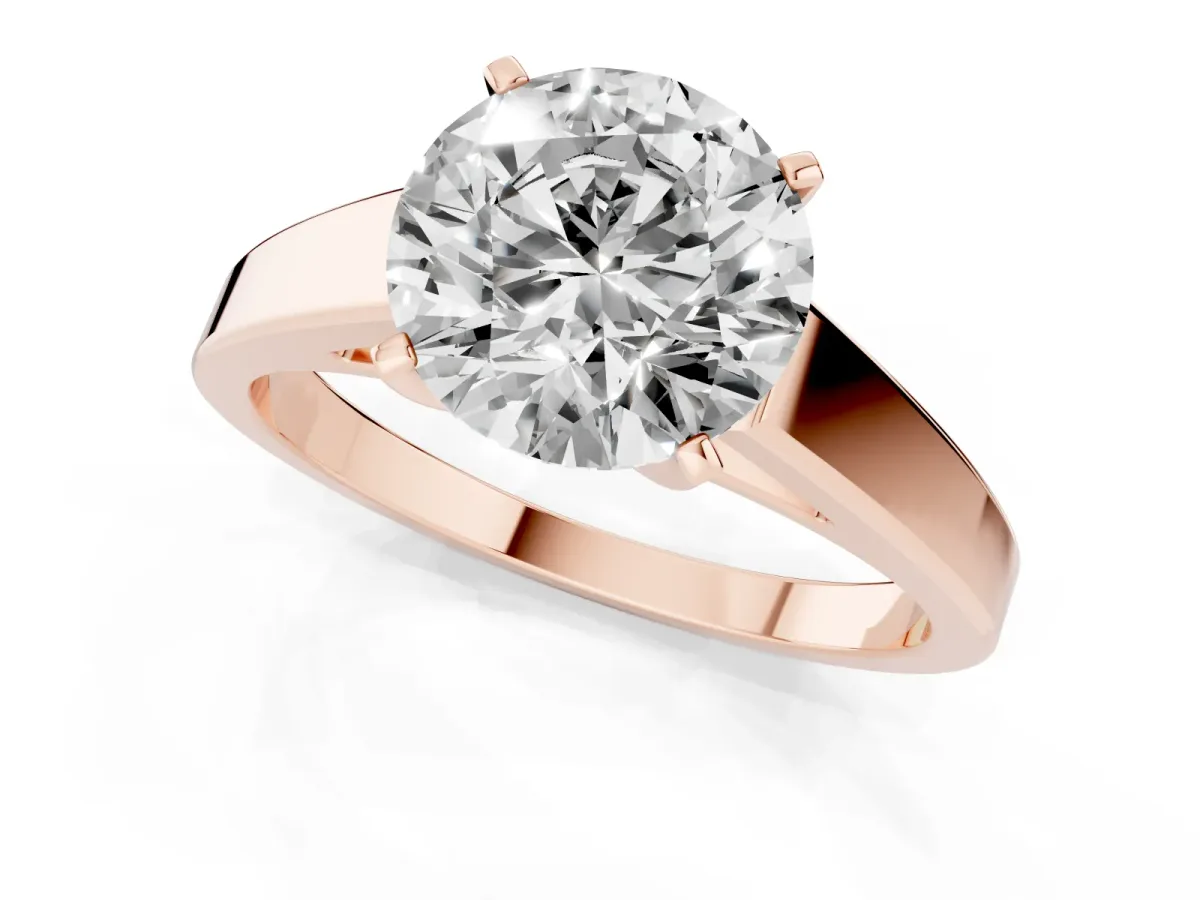 Round Cut Solitaire Engagement Ring with Four-Prong Setting and Tapered Band Rose gold
