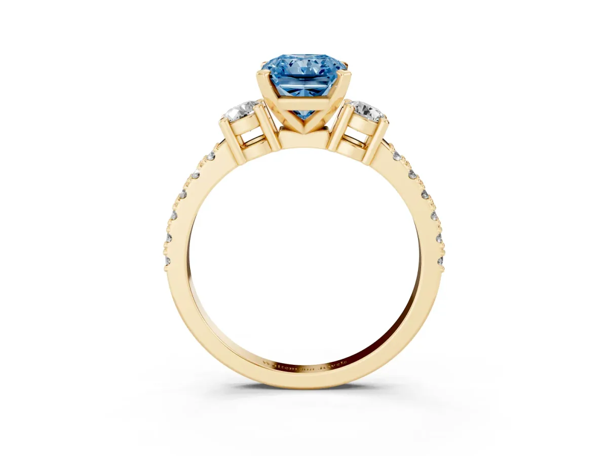 Fancy Blue Radiant Cut Three-Stone Diamond Pavé Band with Prong Setting Yellow gold