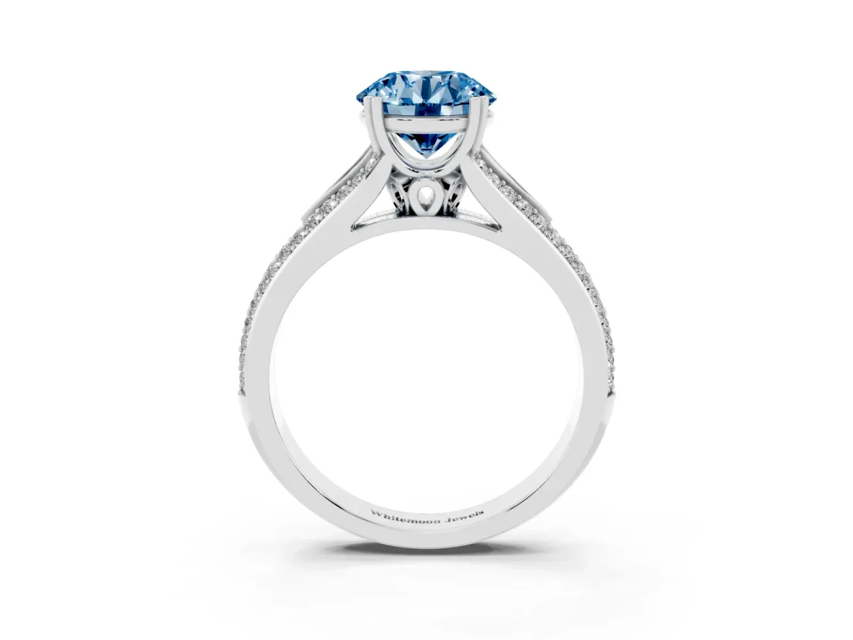 Fancy Blue Round Cut Diamond Split Shank Engagement Ring with Pavé Band Silver