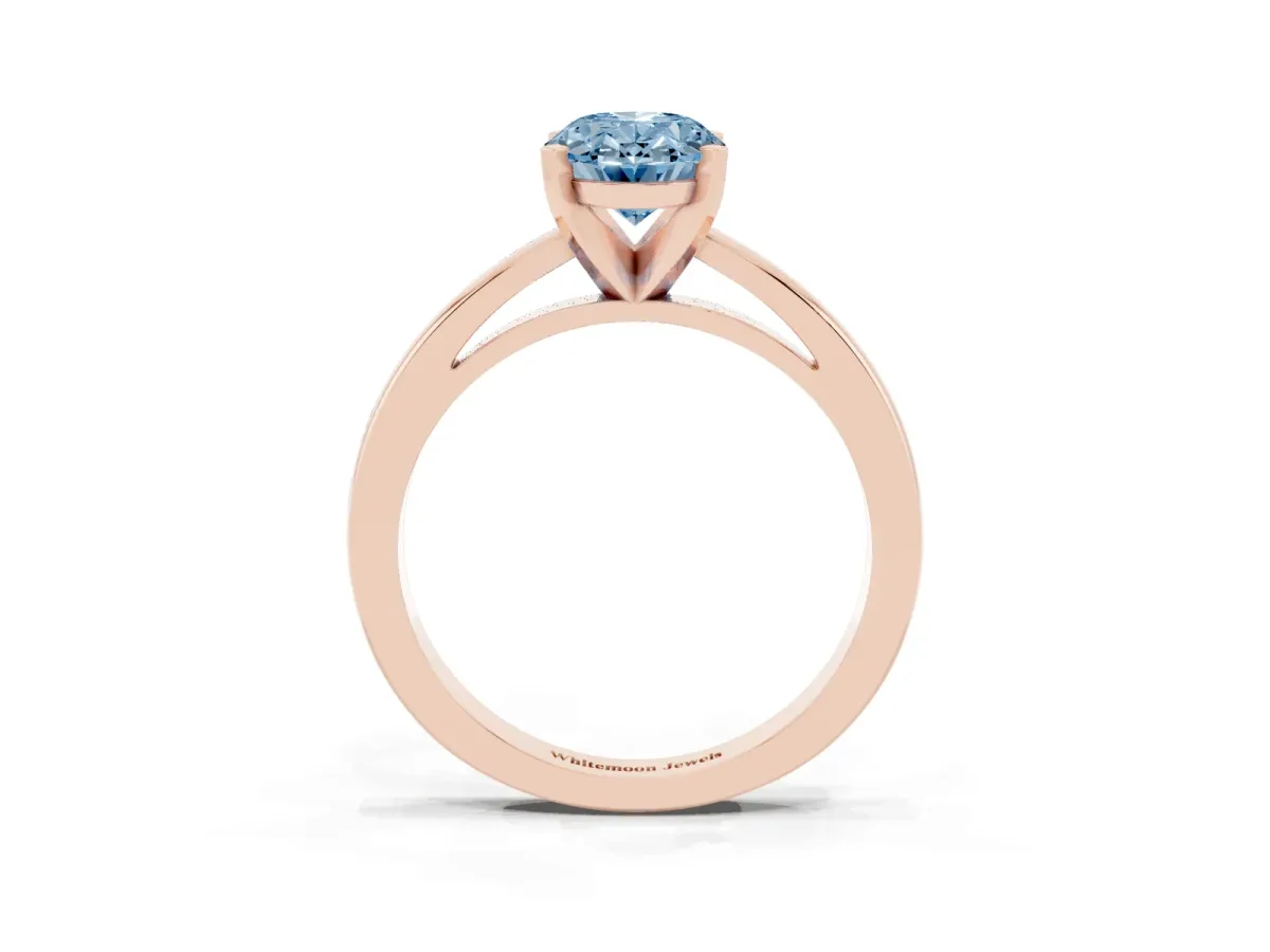 Fancy Blue Oval Cut Solitaire Diamond Engagement Ring with Four-Prong Setting on a Classic Band Rose gold