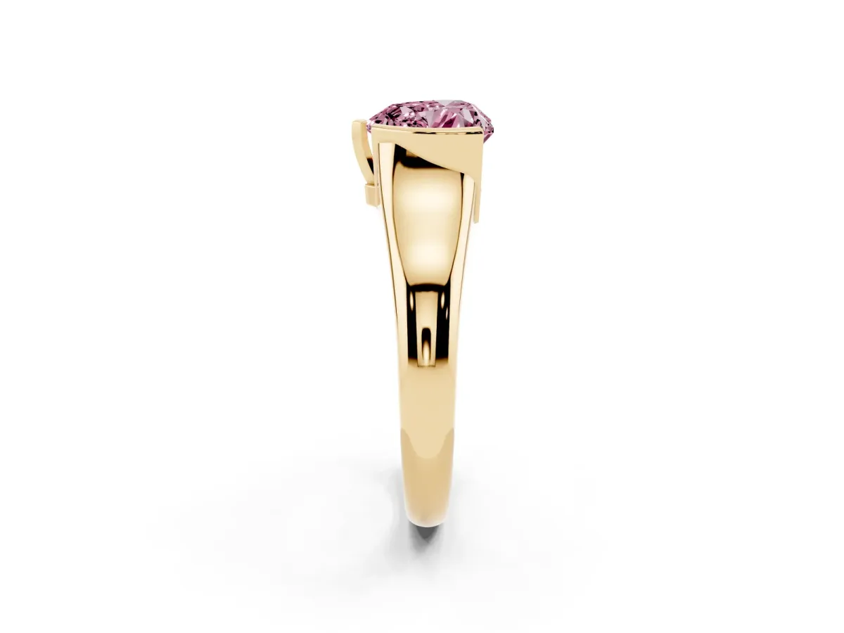 Fancy Pink Heart Cut Solitaire Tension Set Diamond Ring with Split Shank Band Yellow gold
