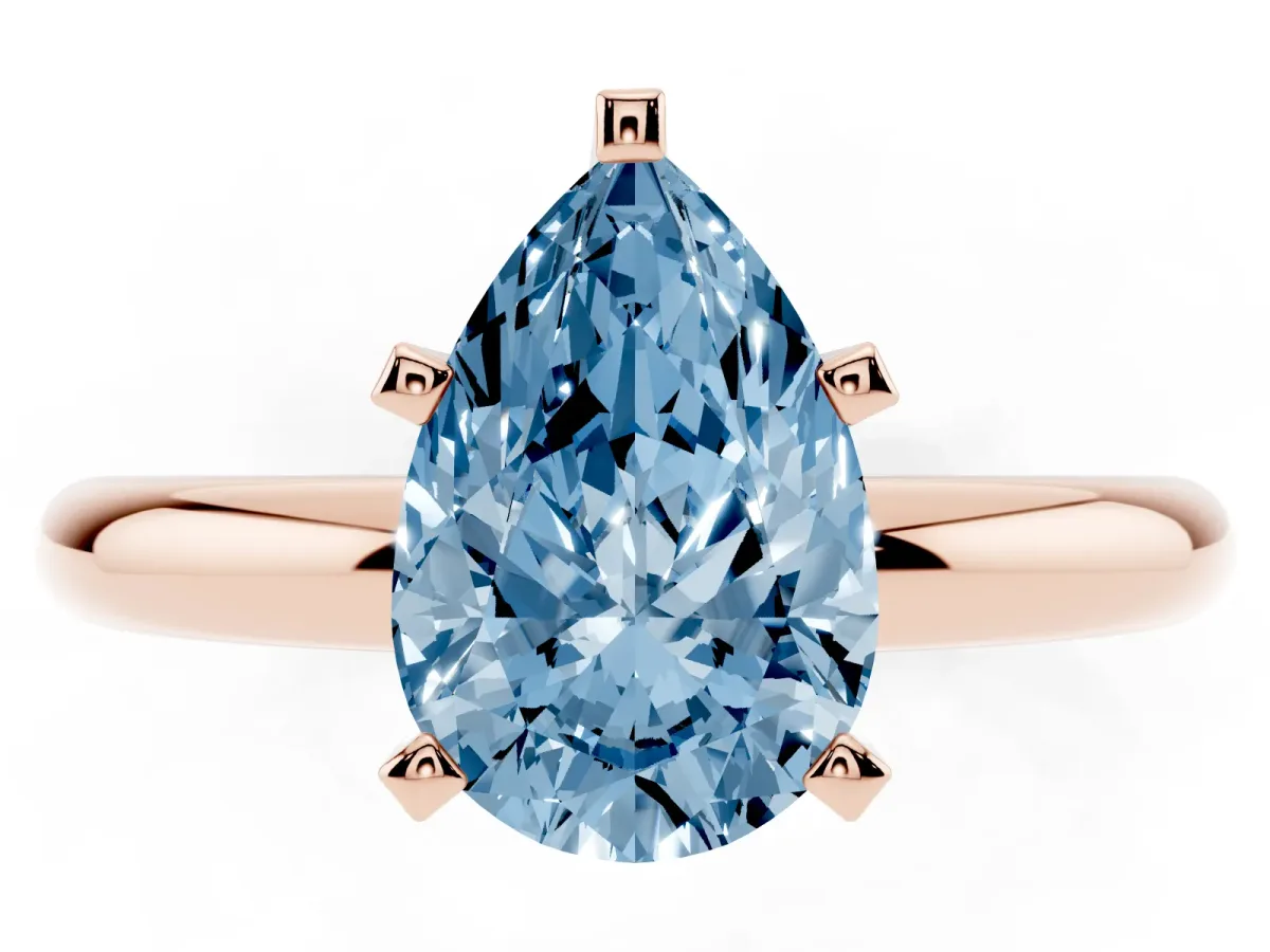 Fancy Blue Pear Cut Diamond Solitaire Engagement Ring with Round Band and Four-Prong Setting Rose gold