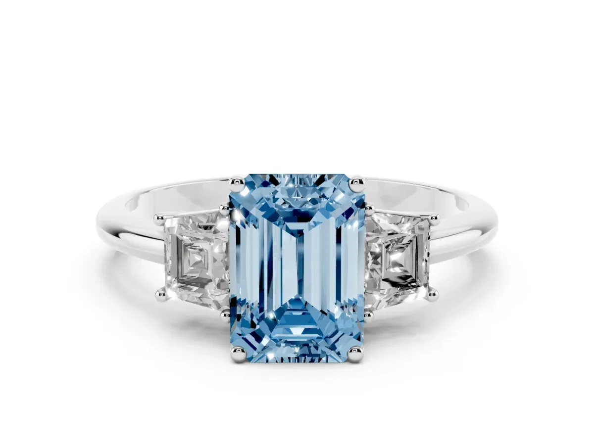 Fancy Blue Emerald Cut Diamond Three-Stone Ring with Trapezoid Side Stones and Prong Setting Platinum