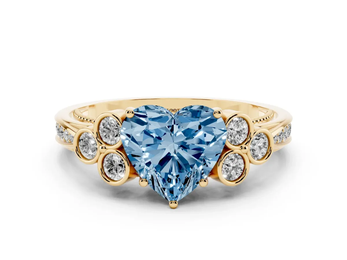 Fancy Blue Heart Cut Cut Diamond Engagement Ring with Bezel Set Round Side Stones and Prong Setting Yellow gold