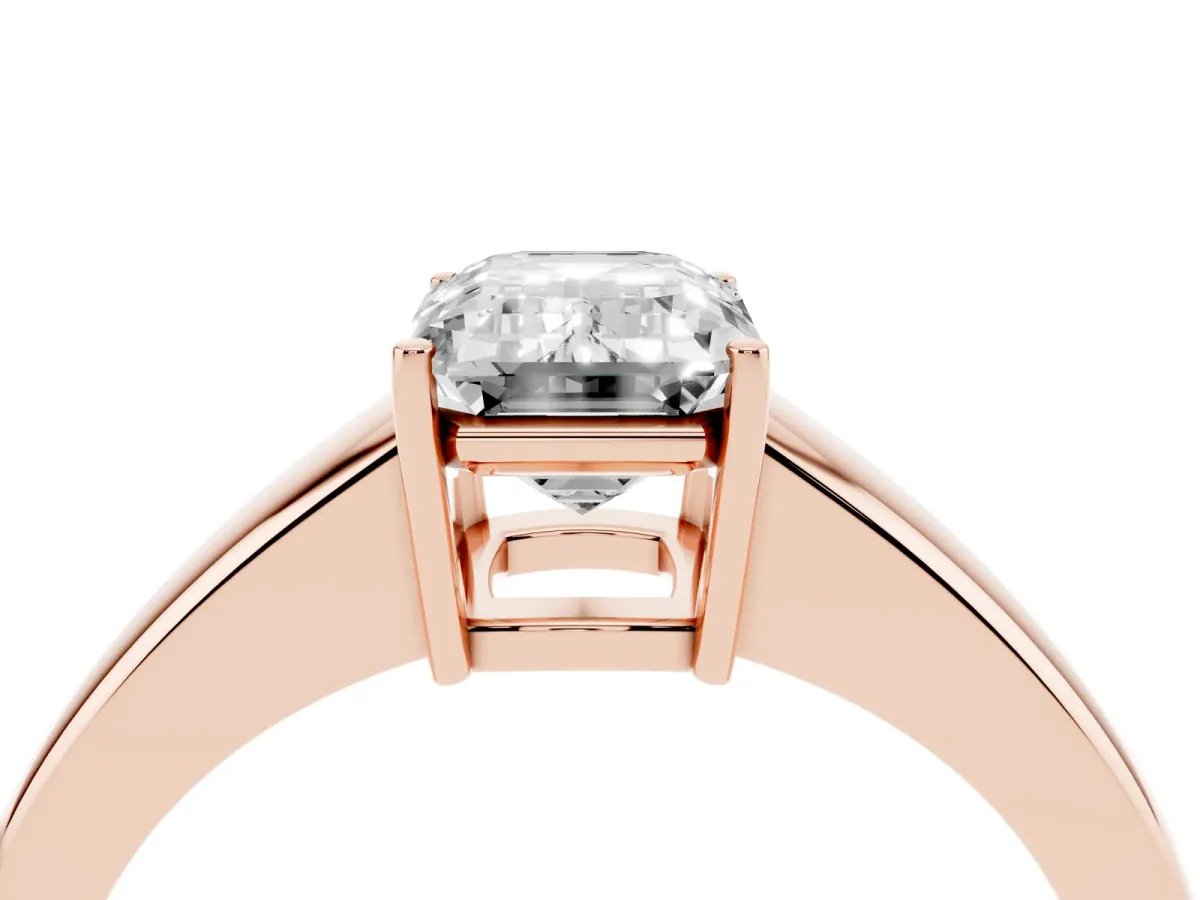 Emerald Cut Solitaire Diamond Ring with Tapered Band and Four-Prong Setting Rose gold