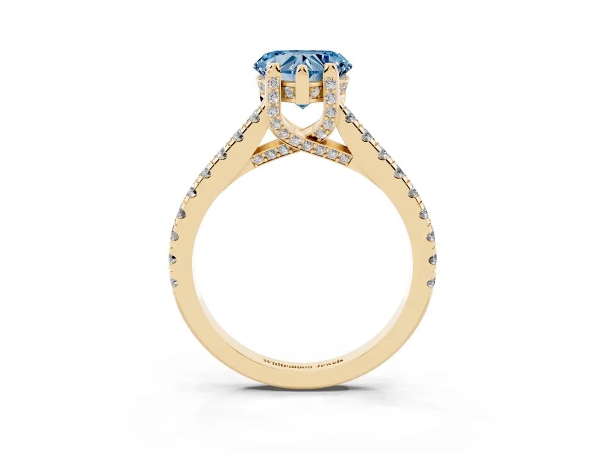 Fancy Blue Heart Cut Brilliant Diamond Solitaire with Pavé Band and Four-Prong Setting Yellow gold