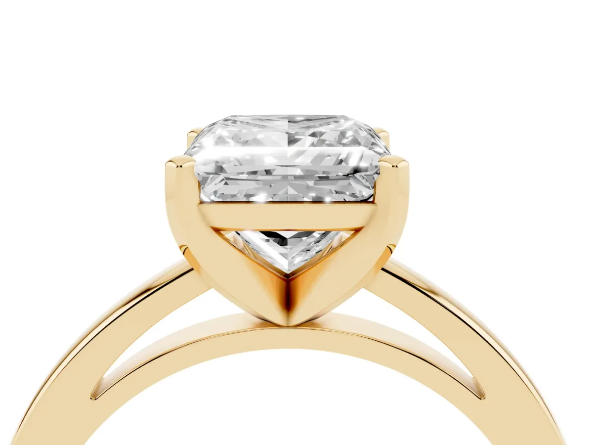 Princess Cut Solitaire Diamond Engagement Ring with Four-Prong Setting on a Classic Band Yellow gold