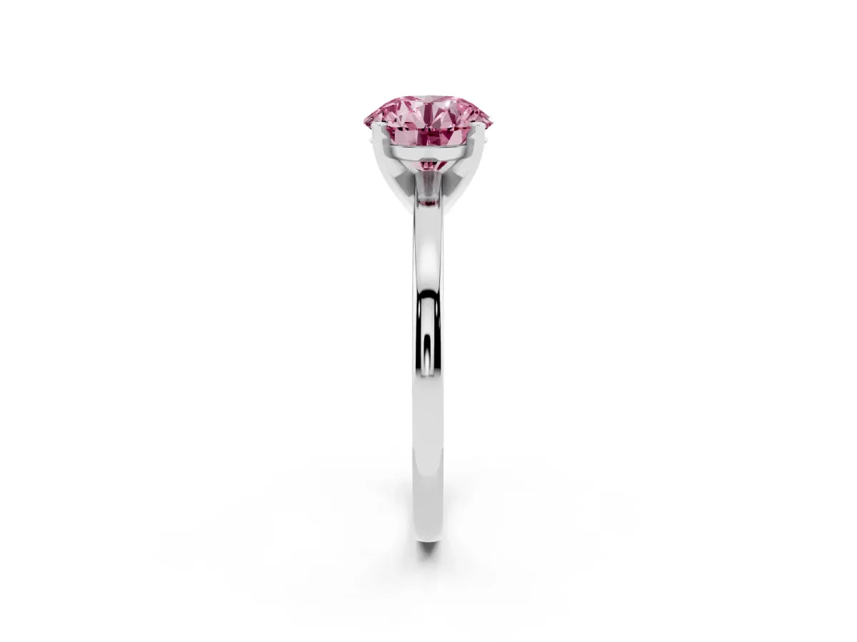 Fancy Pink Round Cut Solitaire Diamond Engagement Ring with Four-Prong Setting on a Classic Band Platinum