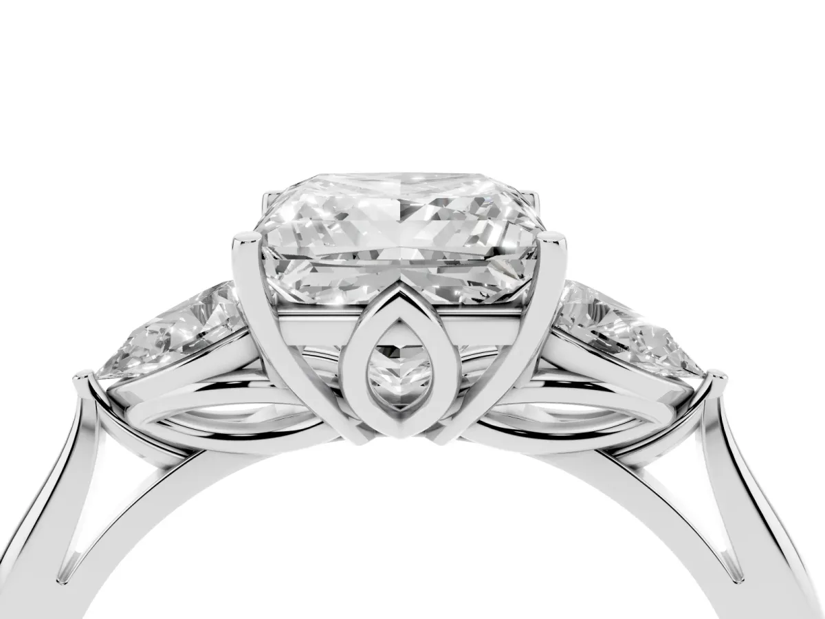 Princess Cut Diamond Three-Stone Ring with Pear Side Stones and Prong Setting Platinum