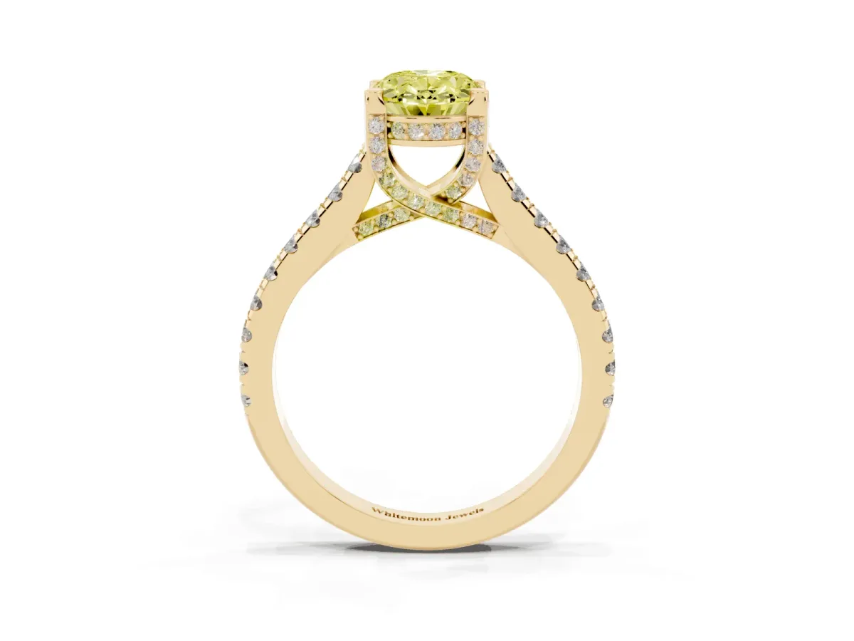 Fancy Yellow Oval Cut Brilliant Diamond Solitaire with Pavé Band and Four-Prong Setting Yellow gold