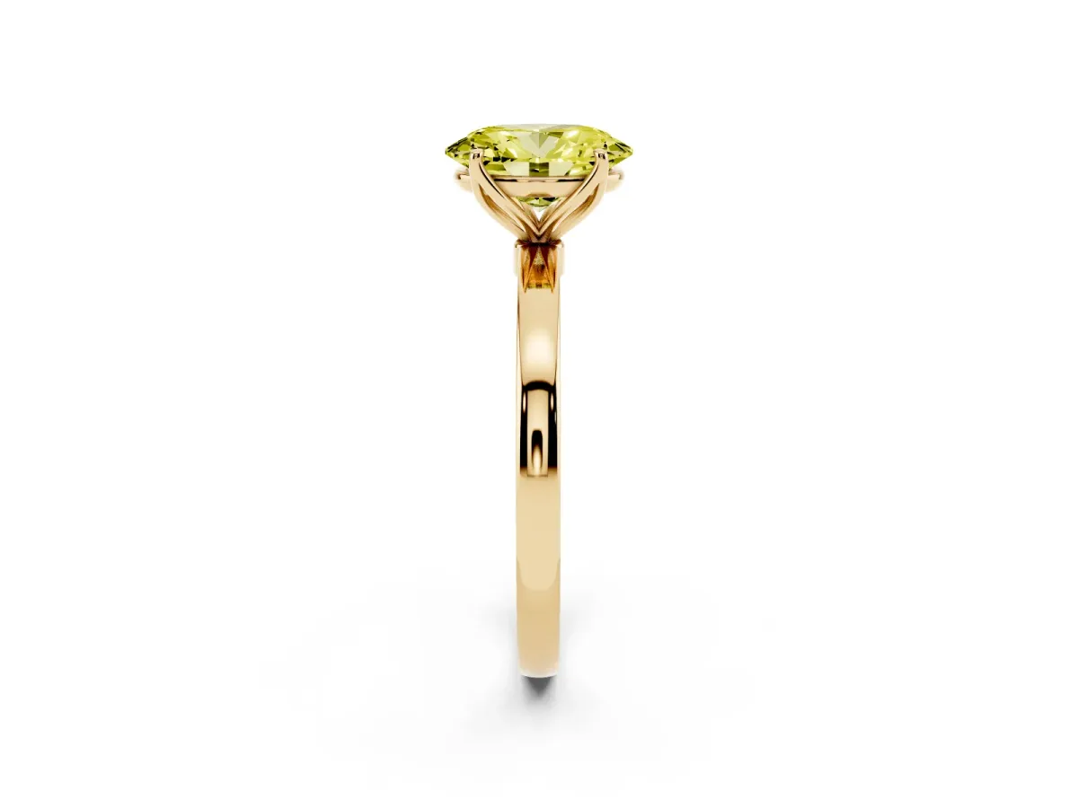 Fancy Yellow Oval Cut Diamond Solitaire Ring with Thin Band and Prong Setting Yellow gold