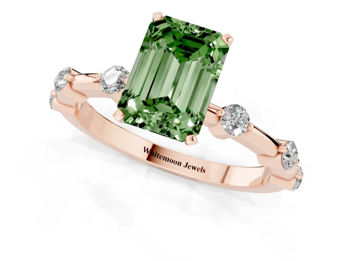 Fancy Green Emerald Cut Solitaire Diamond Ring with Bezel Set Side Stones and Prong Setting Rose gold