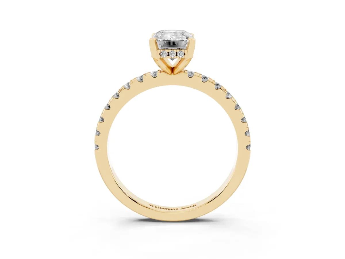 Emerald Cut Diamond Solitaire Ring with Round Pavé Band and Four-Prong Setting Yellow gold