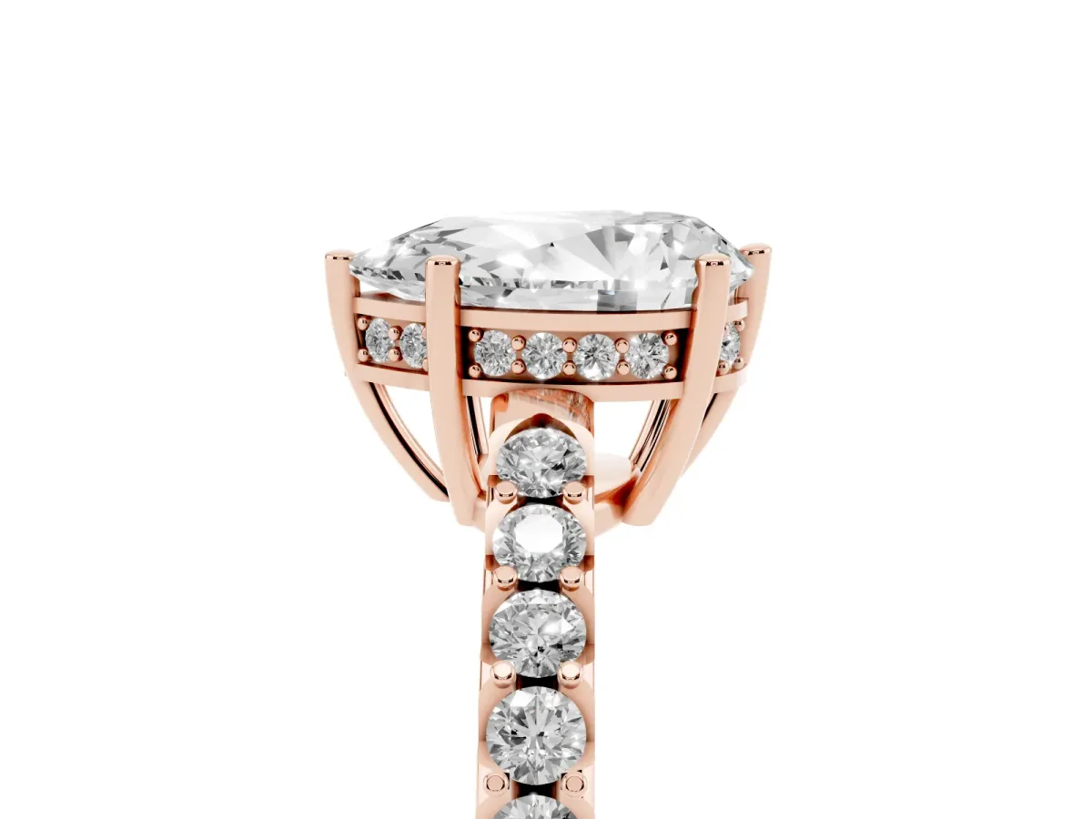 Pear Cut Solitaire Diamond Engagement Ring with Pavé Band and Six-Prong Setting Rose gold
