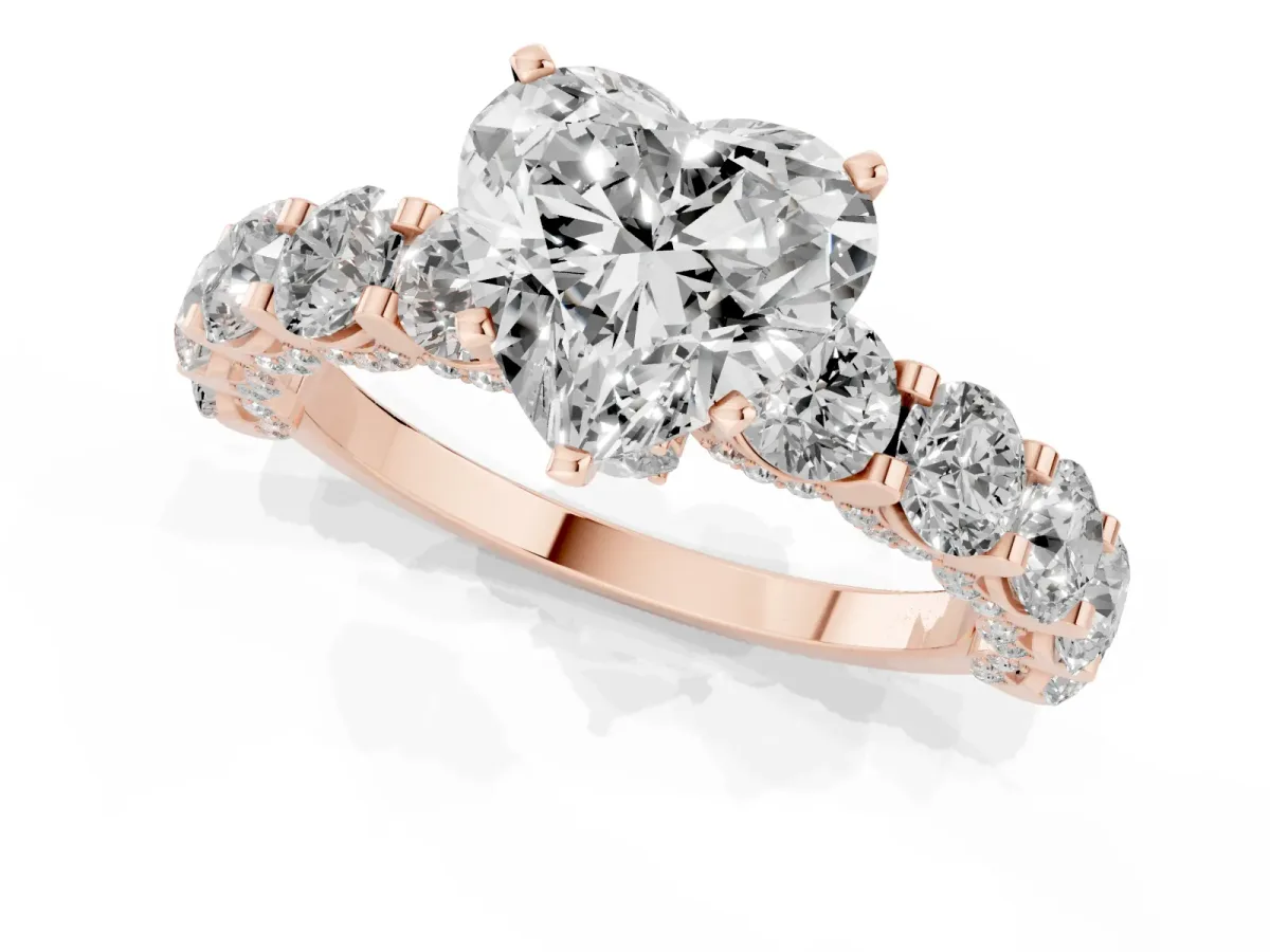 Heart Cut Diamond Side Stone Engagement Ring with Four-Prong Setting Rose gold