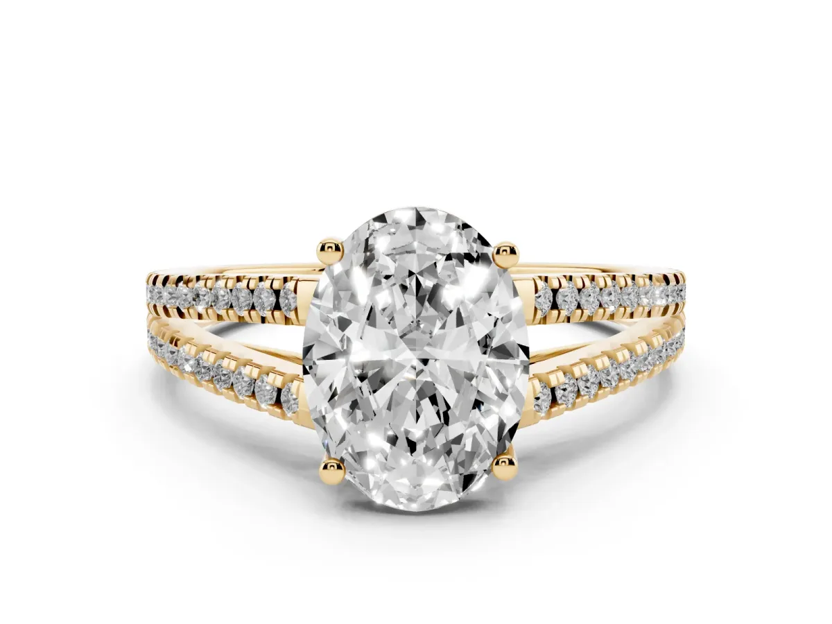 Oval Cut Diamond Solitaire Engagement Ring with Split Shank Pavé Band Yellow gold