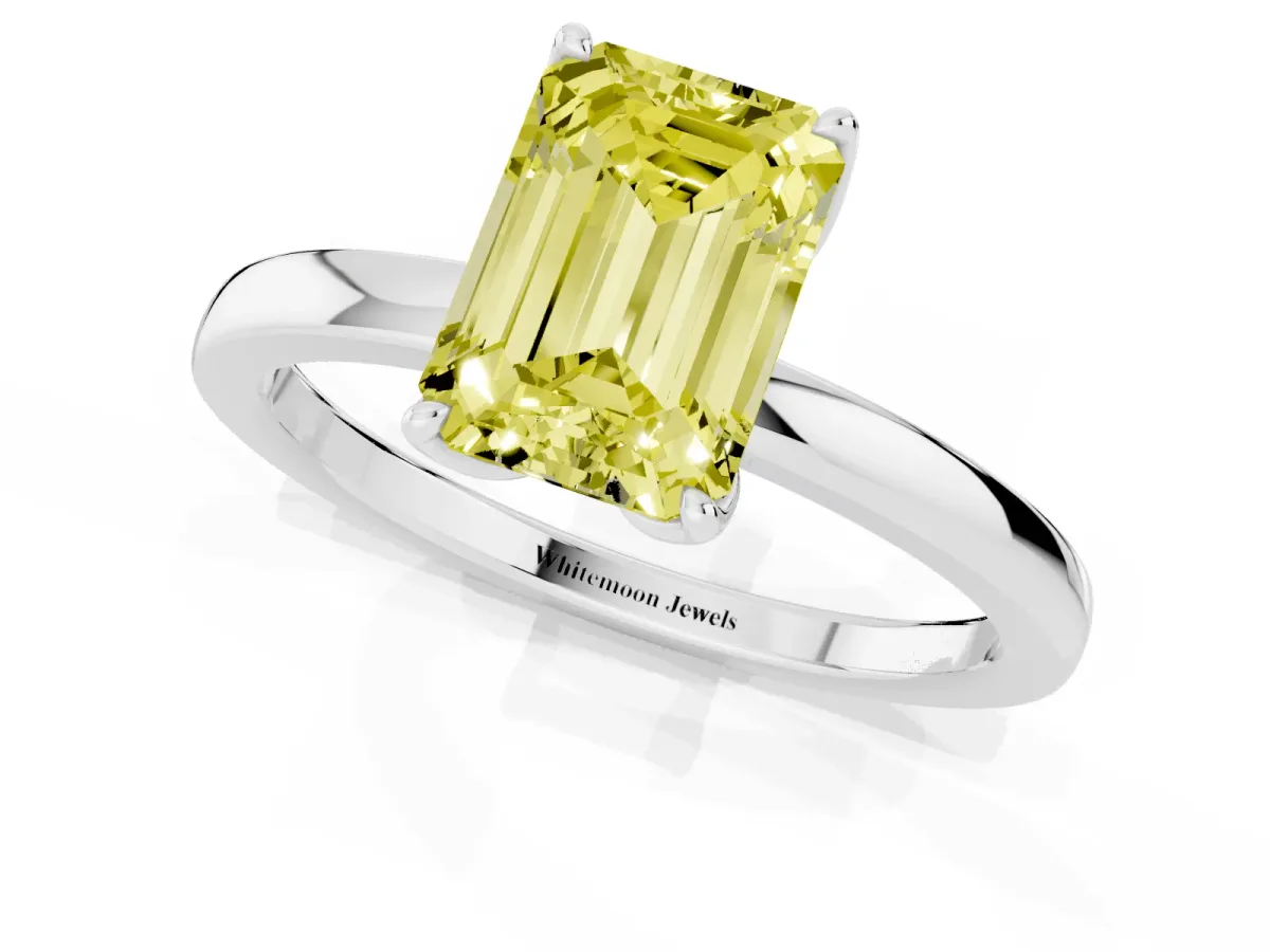Fancy Yellow Emerald Cut Diamond Solitaire Ring with Thin Band and Prong Setting Silver