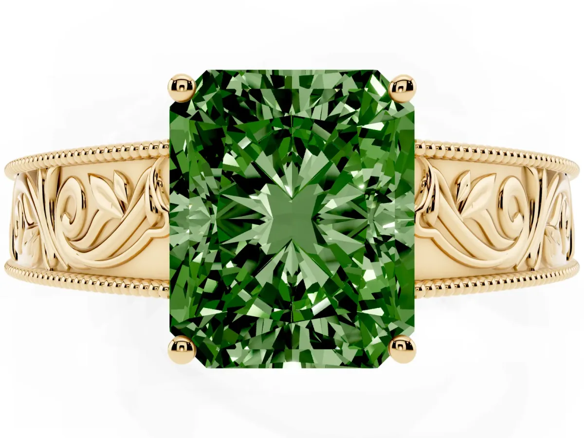Fancy Green Radiant Cut Diamond Solitaire Ring with Engraved Band and Four-Prong Setting Yellow gold