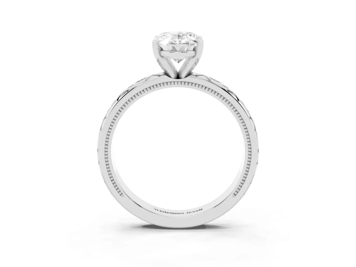 Oval Cut Solitaire Engagement Ring with Scrollwork Band and Four-Prong Setting White gold