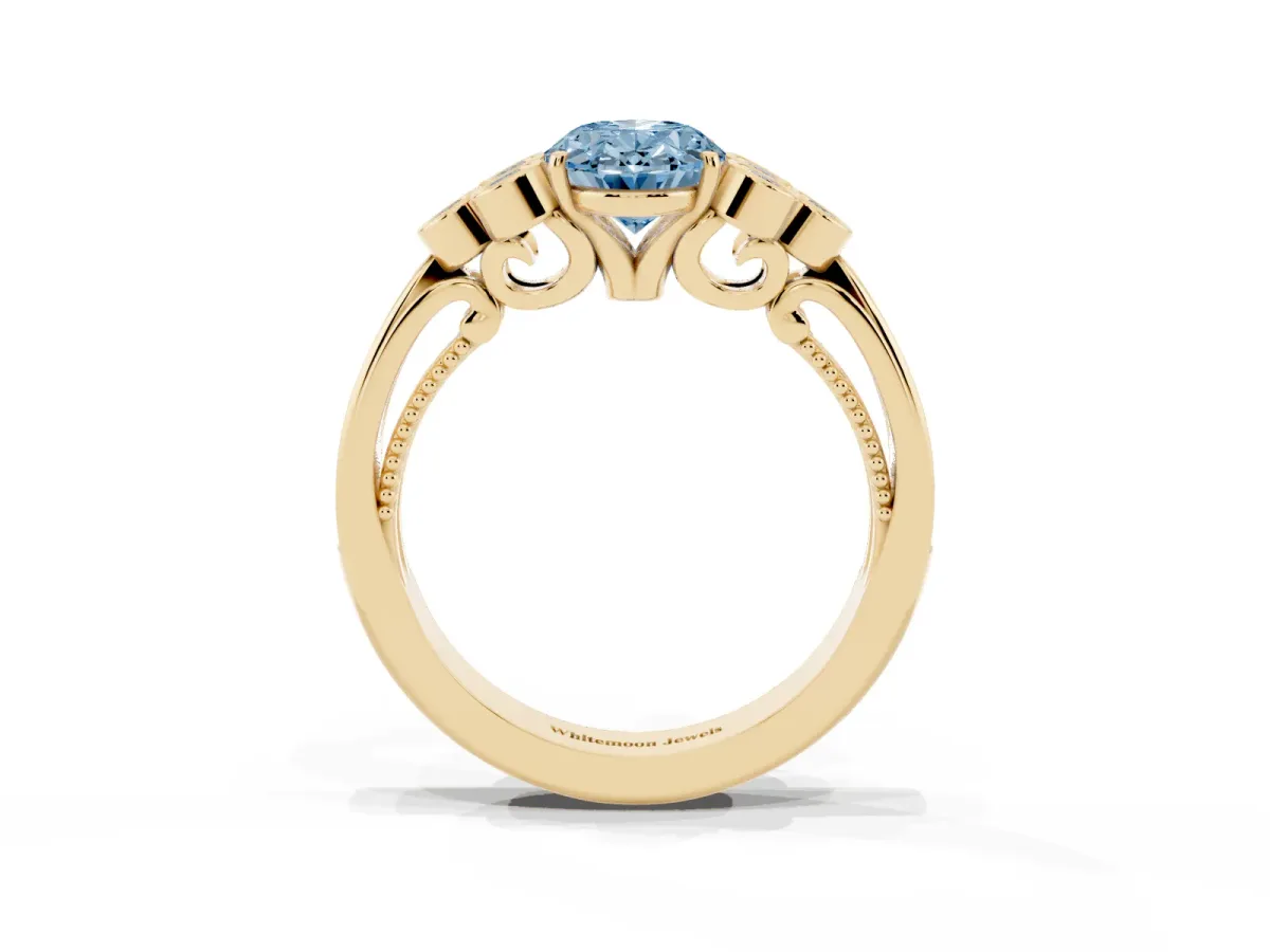 Fancy Blue Oval Cut Cut Diamond Engagement Ring with Bezel Set Round Side Stones and Prong Setting Yellow gold
