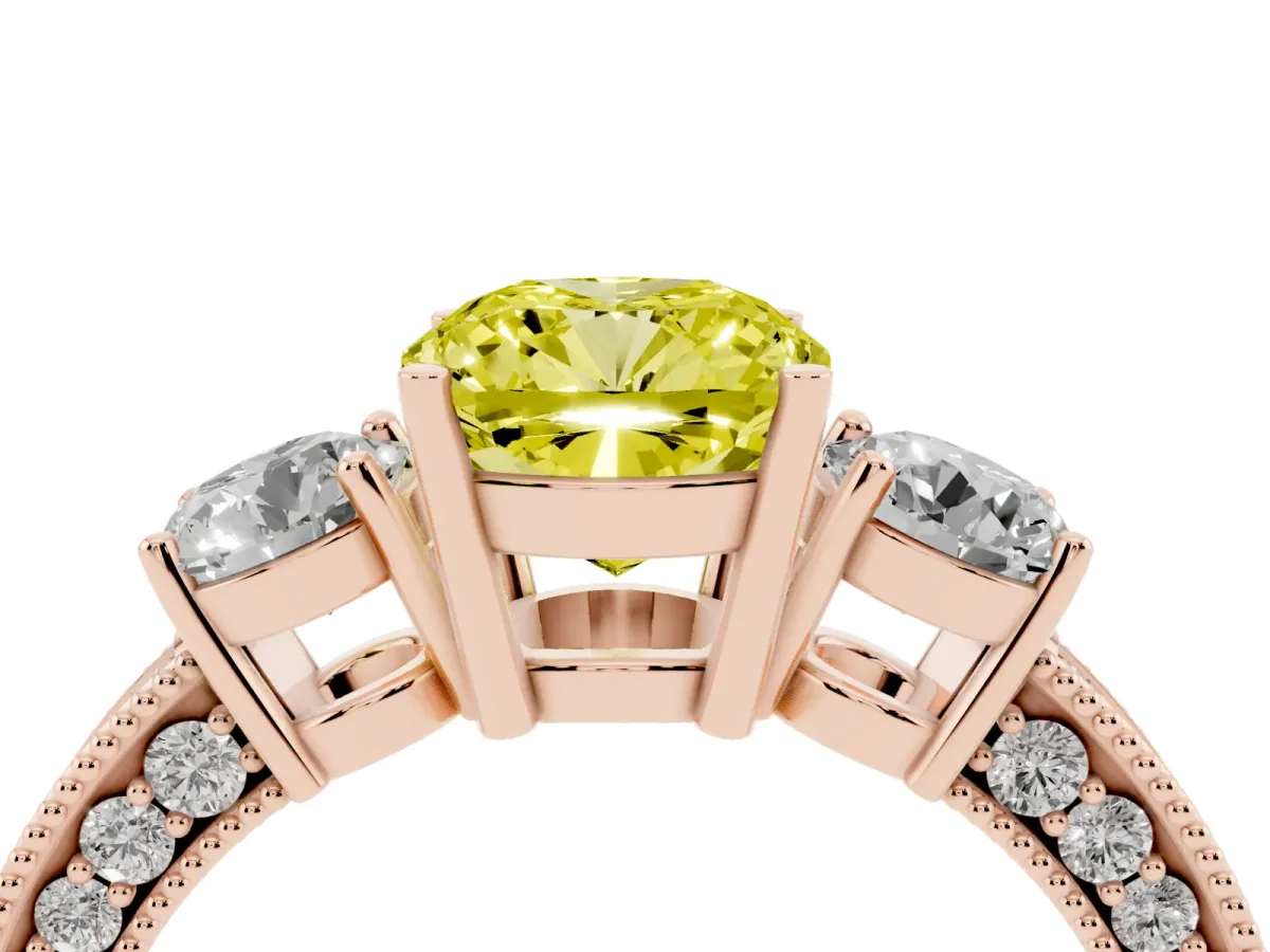 Fancy Yellow Cushion Cut Three-Stone Diamond Ring with Pavé Band and Four-Prong Setting Rose gold