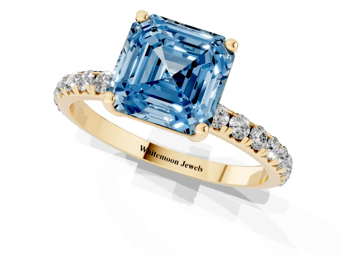 Fancy Blue Asscher Cut Cut Diamond Solitaire Ring with Micro Pave Band and Four Prong Setting Yellow gold