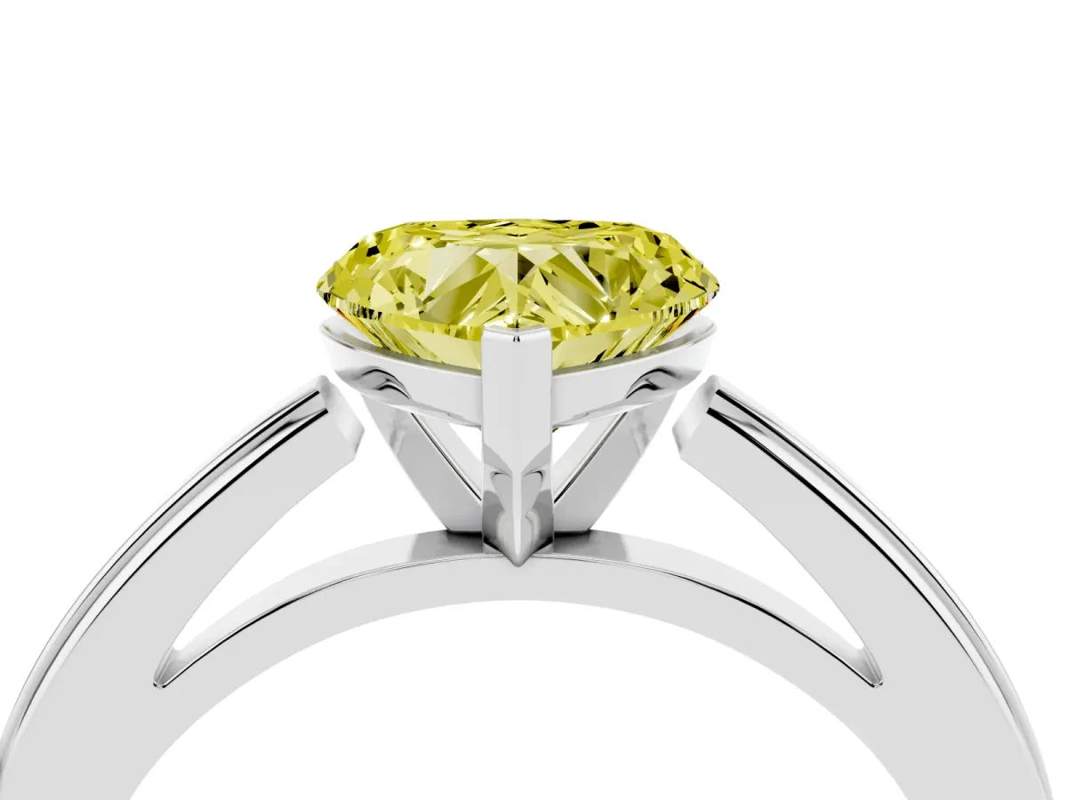 Fancy Yellow Heart Cut Solitaire Diamond Ring with Four-Prong Setting and Classic Band Silver