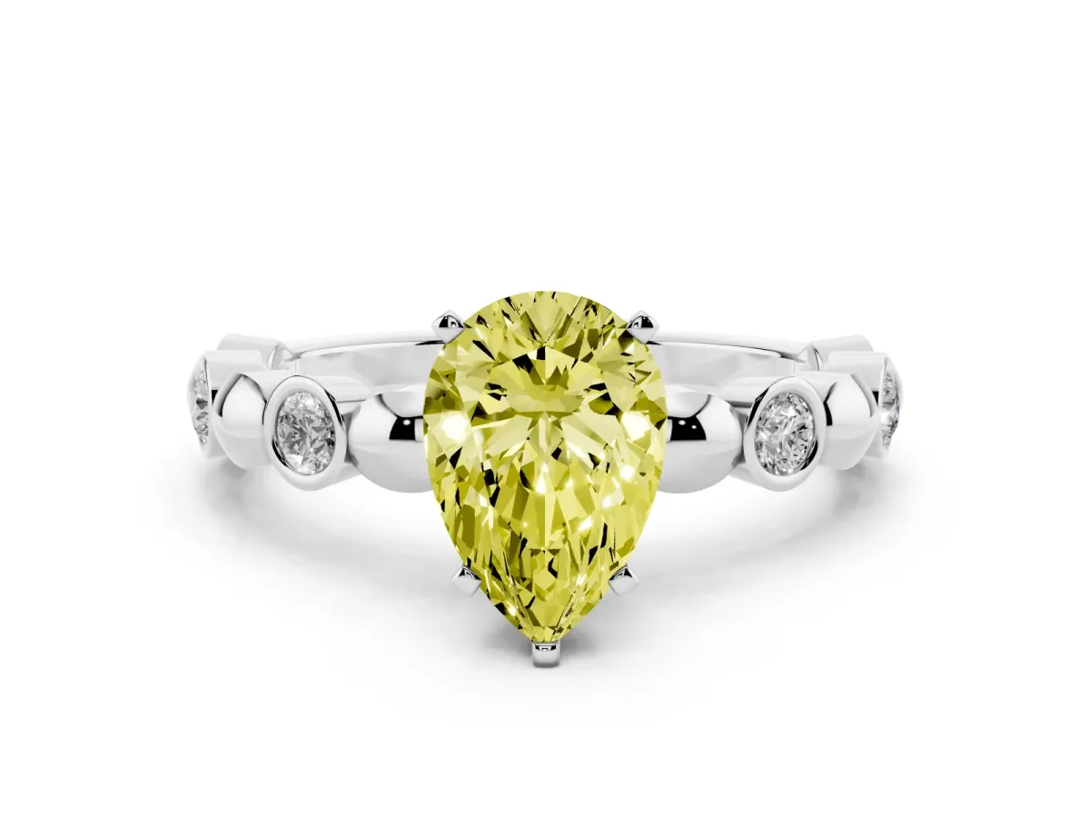 Fancy Yellow Pear Cut Solitaire Bezel-Set Diamond Ring with Beaded Band and Four-Prong Setting Silver