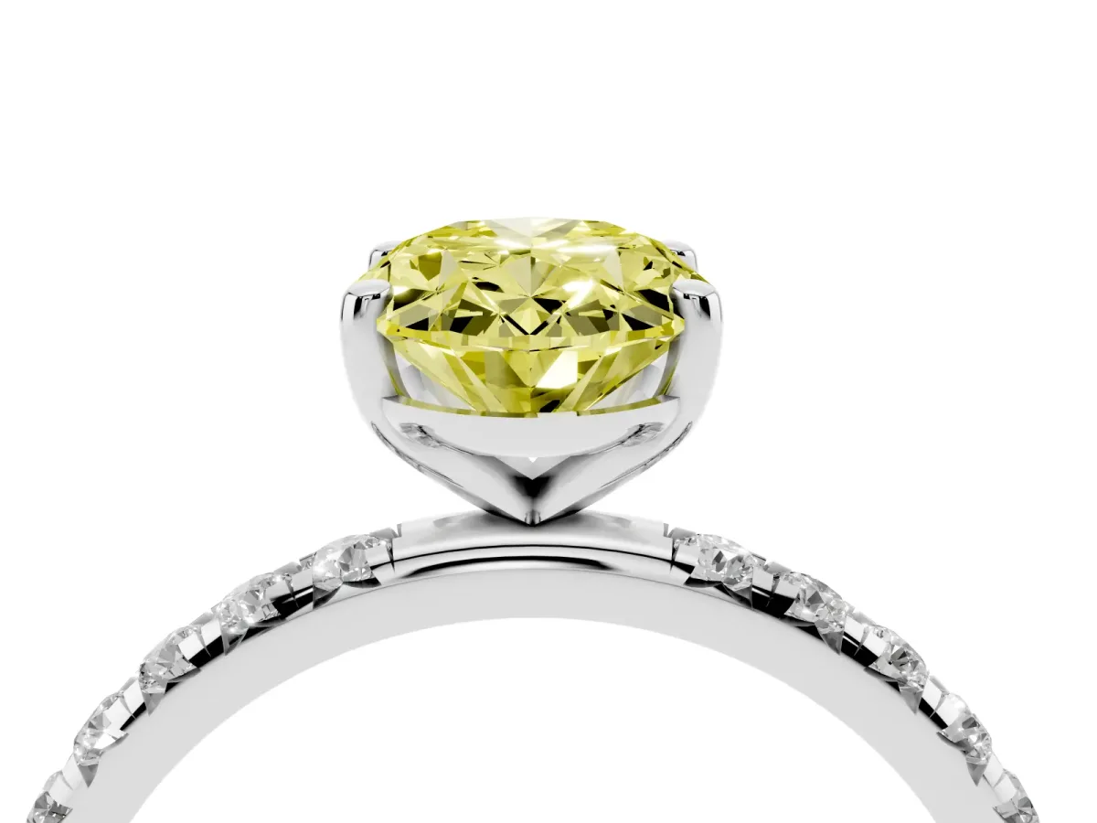 Fancy Yellow Oval Cut Cut Diamond Solitaire Ring with Micro Pave Band and Four Prong Setting Silver