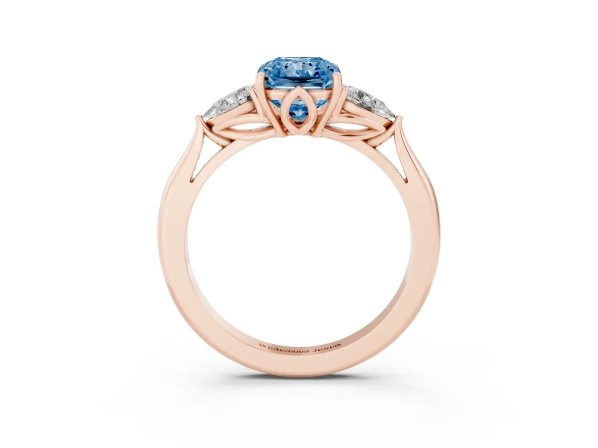 Fancy Blue Three-Stone Radiant Cut Brilliant Diamond Solitaire Ring with Tapered Band and Four-Prong Setting Rose gold