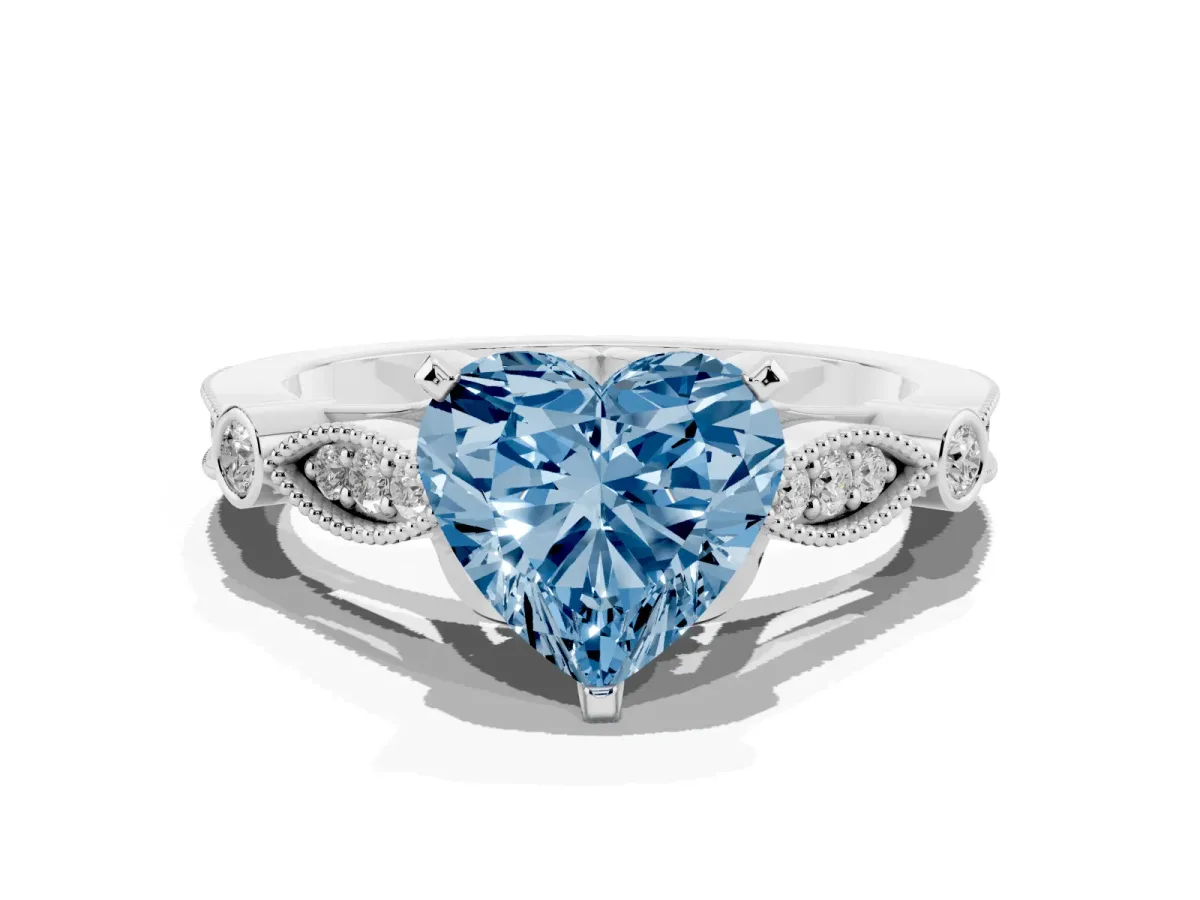 Fancy Blue Heart Cut Cut Diamond with Milgrain Marquise and Bezel Accents on a Solitaire Band with Prong Setting Platinum