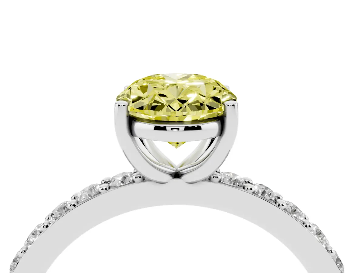 Fancy Yellow Oval Cut Cut Diamond Solitaire with Pave Band and Four-Prong Setting Silver