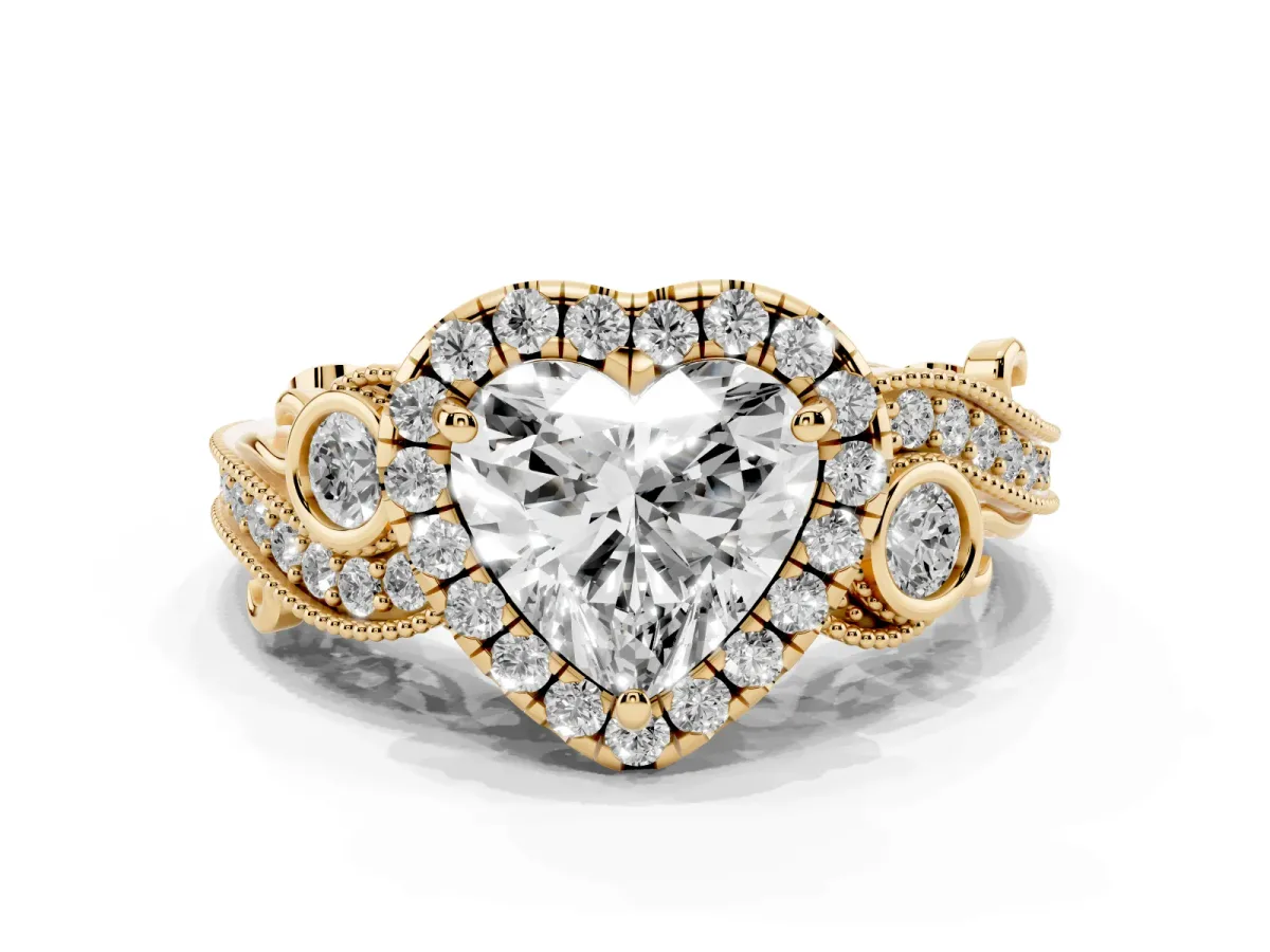 Heart Cut Halo Diamond Ring with Milgrain and Bezel Accents on a Split Shank Band Yellow gold
