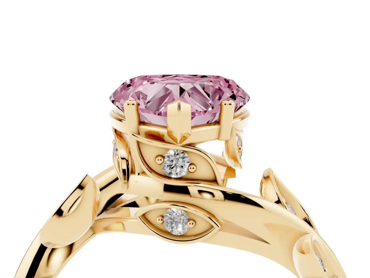 Fancy Pink Heart Cut Solitaire Twist Engagement Ring with Leaf Accents and Prong Setting Yellow gold